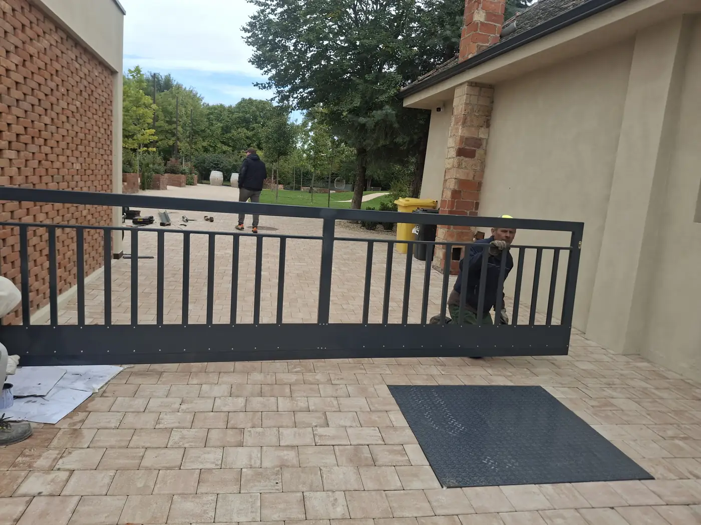 Sliding gate made of steel sections, installed for a client